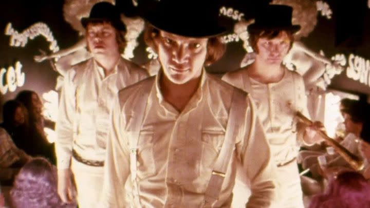 Malcolm McDowell as Alex DeLarge with two of his friends in the film A Clockwork Orange.