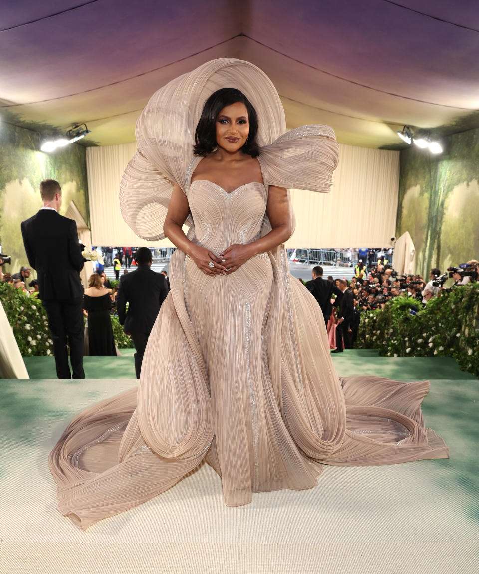 Mindy Kaling in a sand-coloured gown at the 2024 Met Gala. (Image via Getty Images)