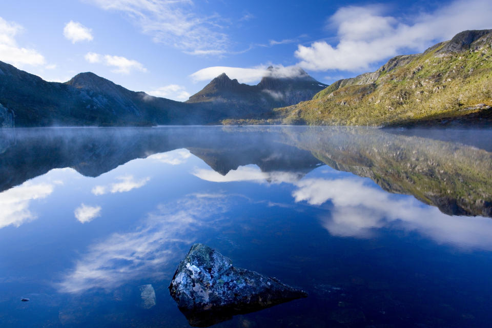 Dove Lake in front of massive Cradle Mountain in Tasmania as the state shuts out Australians. Source: AAP