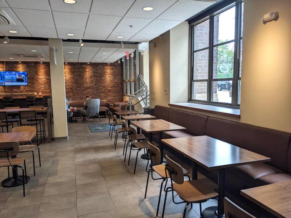 Seating areas along the walls at Matt’s Café in Belleville provide customers with charging stations for laptops, phones and other devices.