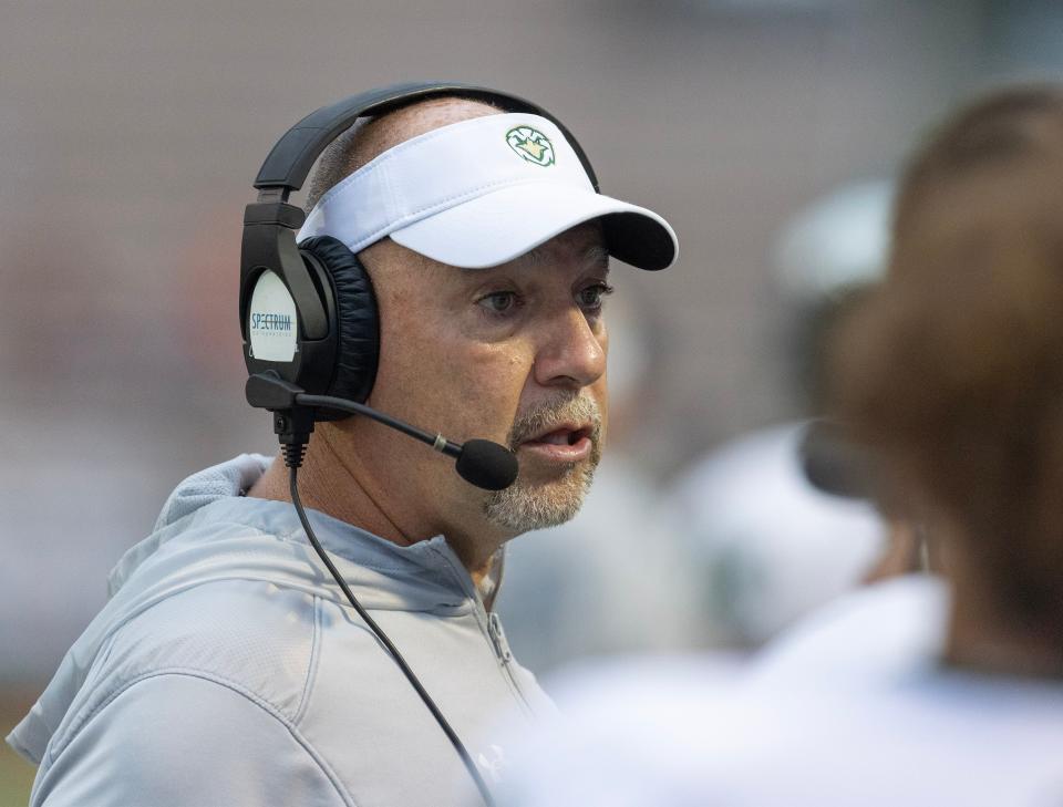 GlenOak head coach Scott Garcia works the sidelines against Massillon at Massillon Friday, August 25, 2023.