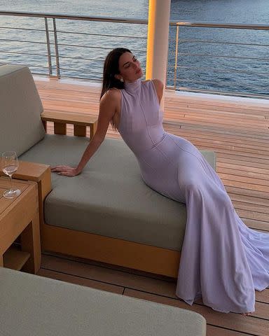 <p>Kendall Jenner/Instagram</p> Kendall Jenner wears sheer look on a yacht, which garners a hilarious reaction from her sister Khloé Kardashian