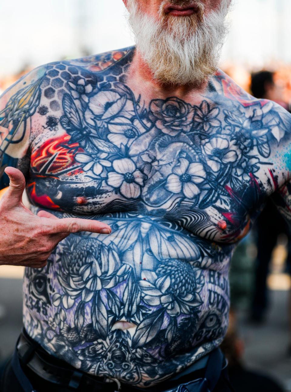 One man proudly showed off his body art at Friday's Louder Than Life music festival. Sept. 22, 2023