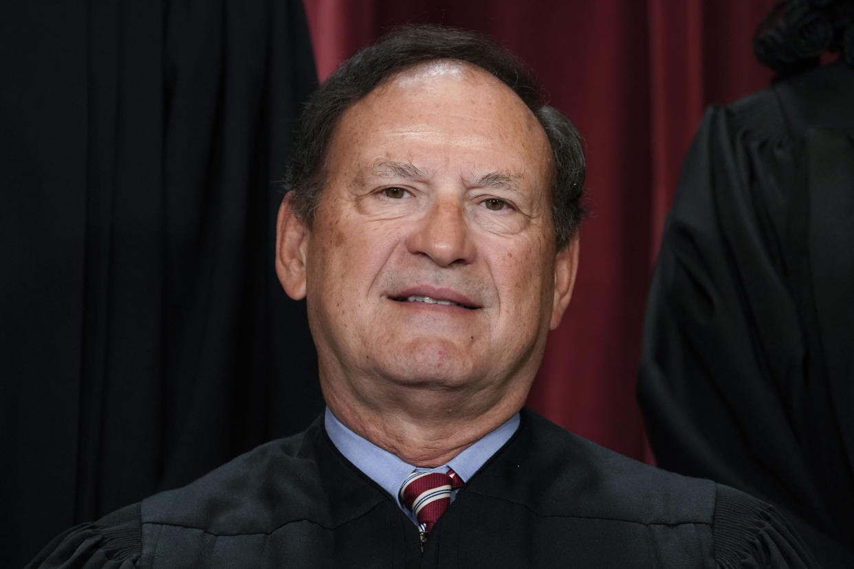 Justice Samuel Alito joins other members of the Supreme Court as they pose for a new group portrait, at the Supreme Court building in Washington, Oct. 7, 2022. (J. Scott Applewhite/AP)