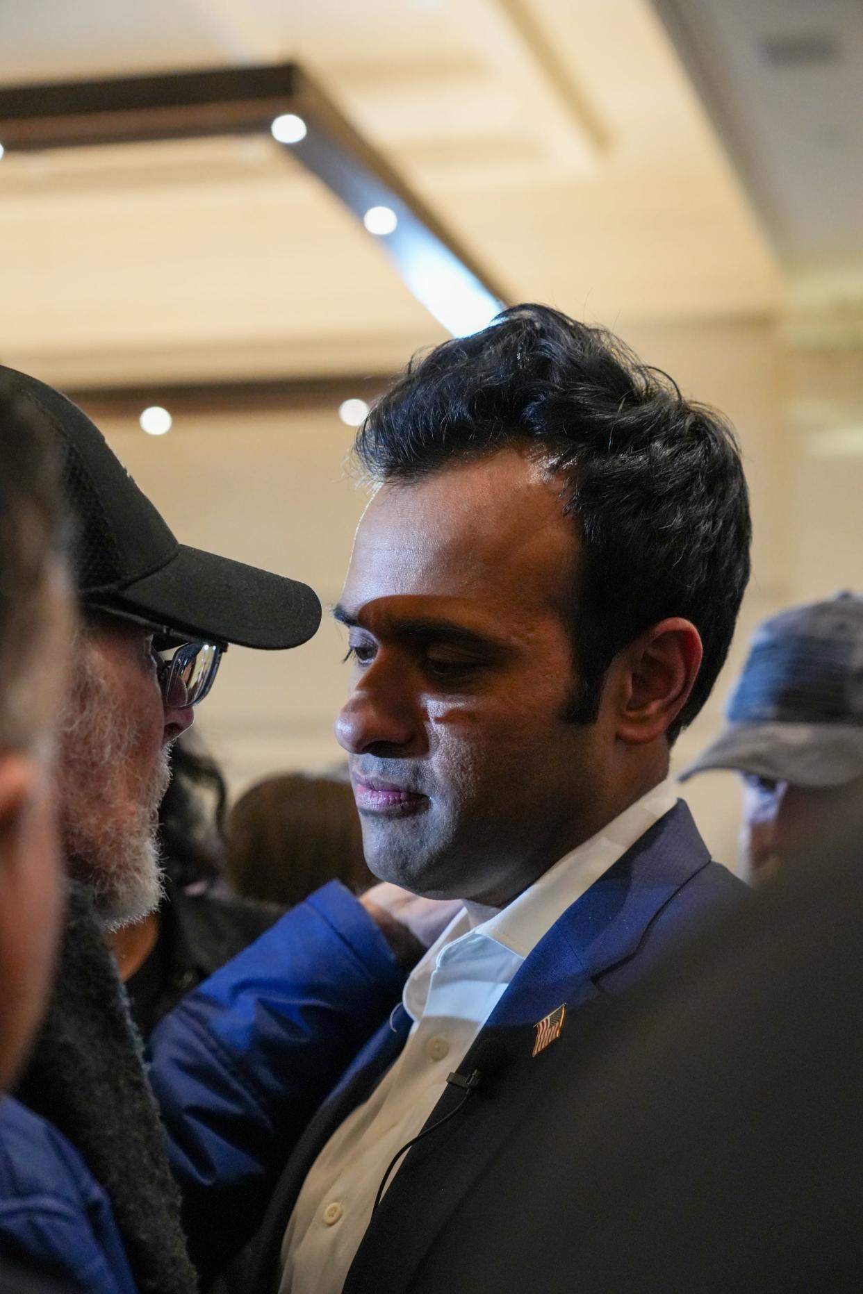 GOP presidential candidate Vivek Ramaswamy talks to a supporter after ending his presidential bid on Monday, Jan. 15, 2024, at Surety Hotel in Des Moines.