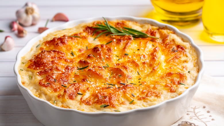 scalloped potatoes in baking dish