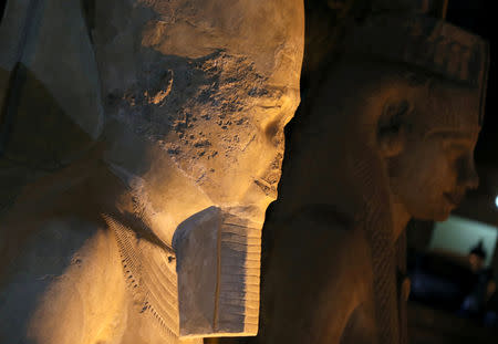 Newly renovated statue of Ramses II (L), from 70 broken pieces to a full colossus, Sohag, Egypt April 5, 2019. REUTERS/Mohamed Abd El Ghany