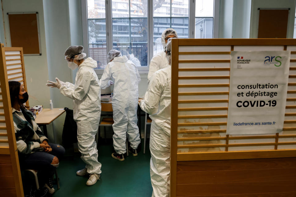 A student of the Emile Dubois high school takes part to a COVID-19 antigen test in Paris, Monday Nov. 23, 2020. Experts said they are less accurate than the standard PCR test, which detects even the tiniest genetic trace of the virus. Many governments including in France have started deploying them as a precursor to PCR tests.( Ludovic Marin, Pool via AP)