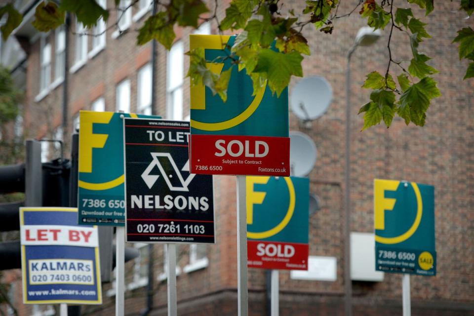 Letting and estate agents signs outside flats (Anthony Devlin/PA) (PA Wire)