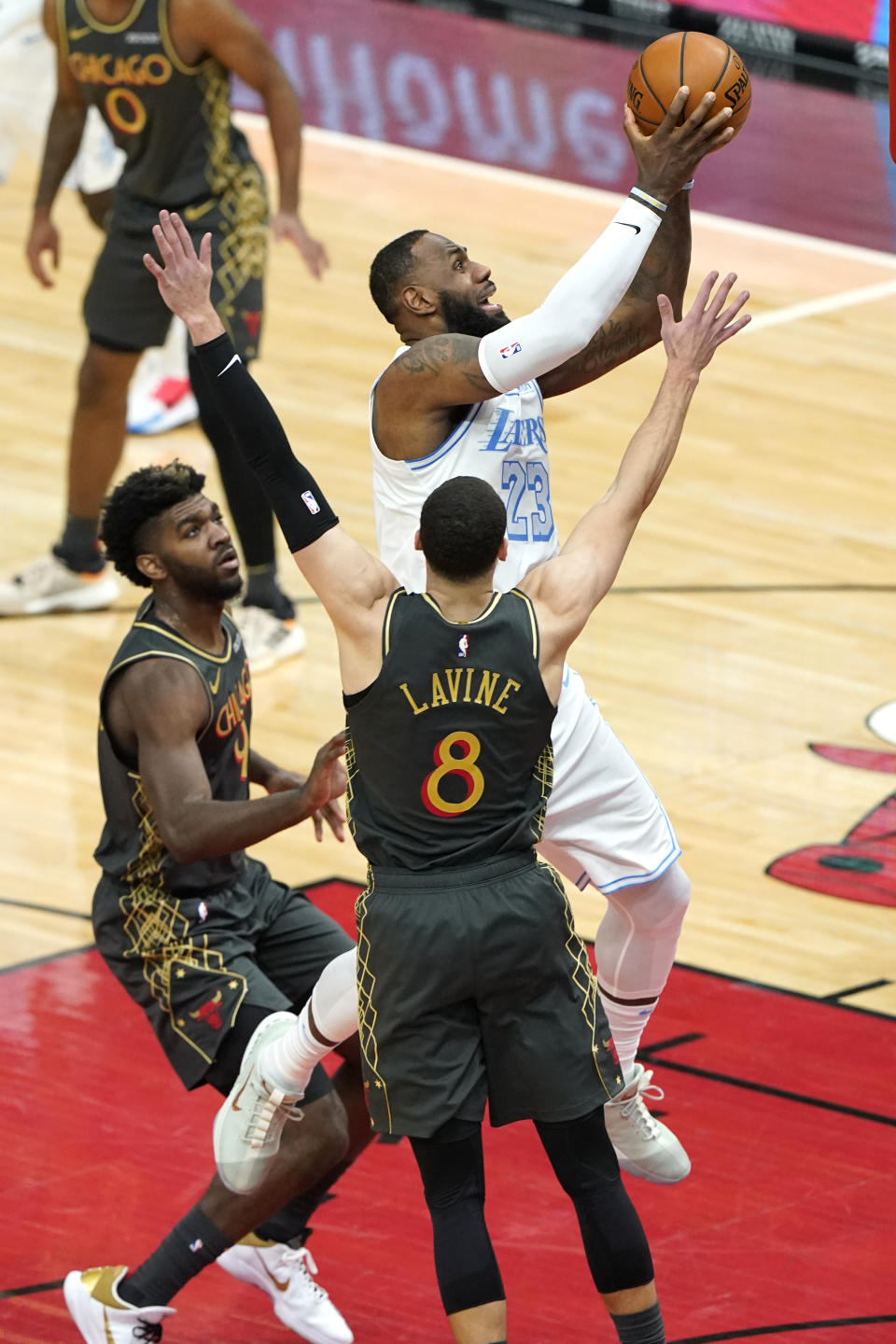 Los Angeles Lakers forward LeBron James drives to the basket against the Chicago Bulls during the second half of an NBA basketball game in Chicago, Saturday, Jan. 23, 2021. (AP Photo/Nam Y. Huh)