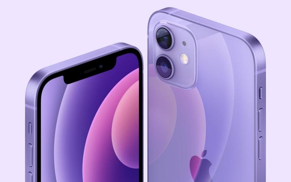 A press image released by Apple of a shining purple iPhone, its dual cameras and bevelled screen glistening  - Apple