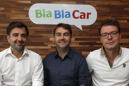 Frederic Mazzella (C), Founder and Chief Executive Officer of French ride-sharing start-up BlaBlaCar, Nicolas Brusson (L), Co-Founder and COO of BlaBlaCar, and Francis Nappez (R), Co-Founder and CTO of BlaBlaCar, poses at the company's headquarters in Paris, France, September 28, 2016. REUTERS/Philippe Wojazer