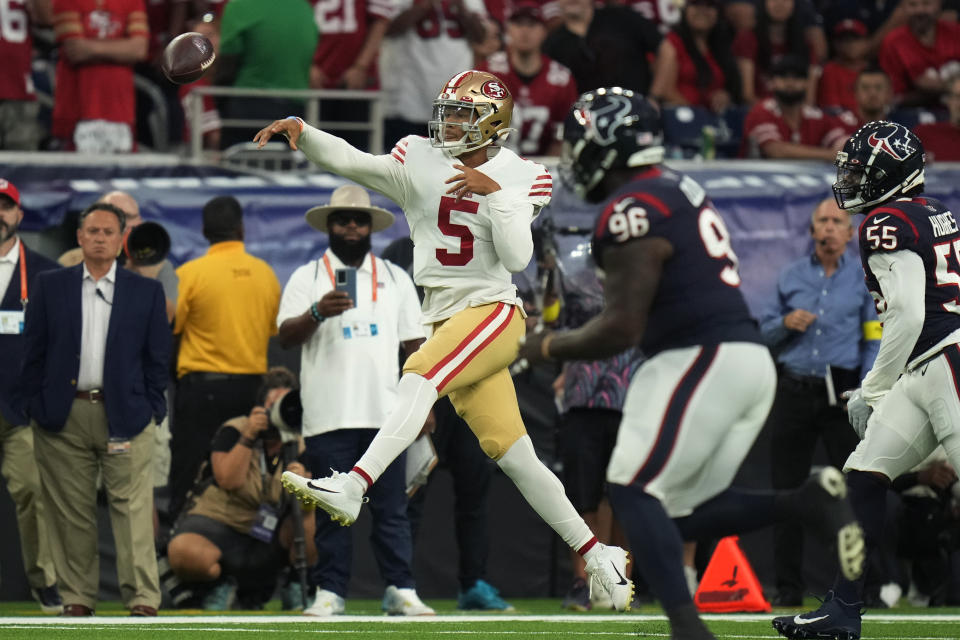San Francisco 49ers quarterback Trey Lance (5) throws against the Houston Texans during the first half of an NFL football game Thursday, Aug. 25, 2022, in Houston. (AP Photo/Eric Christian Smith)