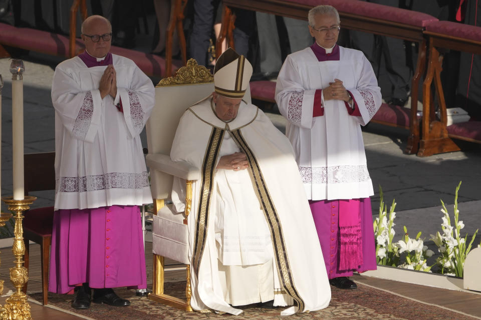 Pope Francis presides over a mass concelebrated by the new cardinals for the start of the XVI General Assembly of the Synod of Bishops in St. Peter's Square at The Vatican, Wednesday, Oct.4, 2023. Pope Francis is convening a global gathering of bishops and laypeople to discuss the future of the Catholic Church, including some hot-button issues that have previously been considered off the table for discussion. Key agenda items include women's role in the church, welcoming LGBTQ+ Catholics, and how bishops exercise authority. For the first time, women and laypeople can vote on specific proposals alongside bishops (AP Photo/Andrew Medichini)