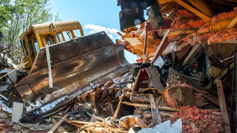 Sask. RCMP arrest man who allegedly bulldozed son's home with people inside