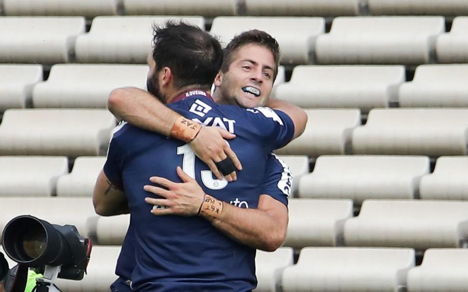 Bordeaux-Begles' team-players celebrate after scoring a try during the European Rugby Challenge Cup quarter-final match between Bordeaux-Begles (UBB) and Edinburgh on September 19, 2020 at the Chaban-Delmas stadium in Bordeaux, southwestern France.  - THIBAUD MORITZ/MORITZ/AFP