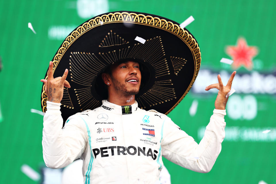 MEXICO CITY, MEXICO - OCTOBER 27: Race winner Lewis Hamilton of Great Britain and Mercedes GP celebrates on the podium during the F1 Grand Prix of Mexico at Autodromo Hermanos Rodriguez on October 27, 2019 in Mexico City, Mexico. (Photo by Mark Thompson/Getty Images)