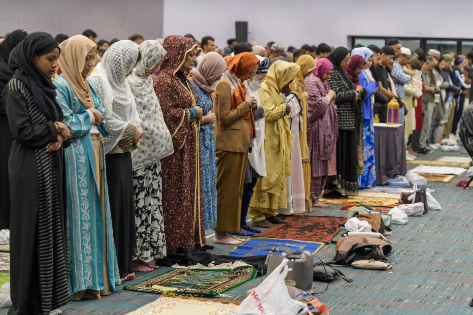 American Muslims women pray to mark the end of the holy month of Ramadan in Los Angeles Wednesday, April 10, 2024. As the war in Gaza enters its seventh month, some Muslim and Arab American leaders have grown frustrated with outreach from President Joe Biden's White House. The fractured relationship could jeopardize the Democratic president's reelection campaign and help pave the way for Republican Donald Trump to return to the White House. (AP Photo/Damian Dovarganes)