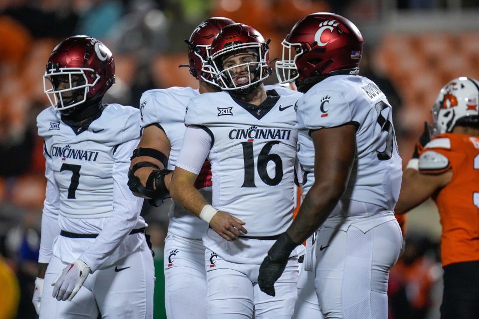 Bearcats coach Scott Satterfield said that backup quarterback Brady Lichtenberg (16) could get time in place of starter Emory Jones if the coach thought he'd give the team a better chance to win.