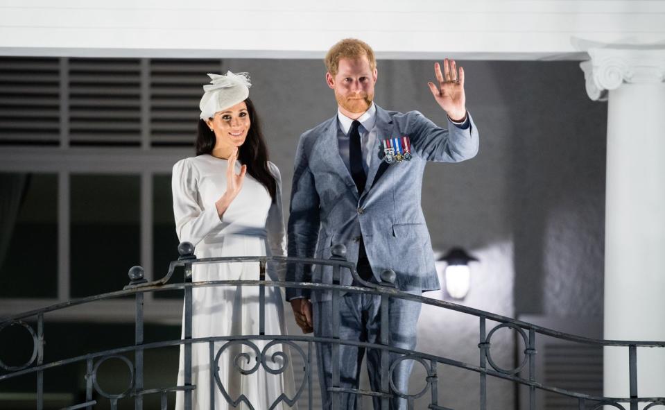 The Duke and Duchess of Sussex are welcomed from the balcony of the Grand Pacific Hotel in Suva, Fiji.