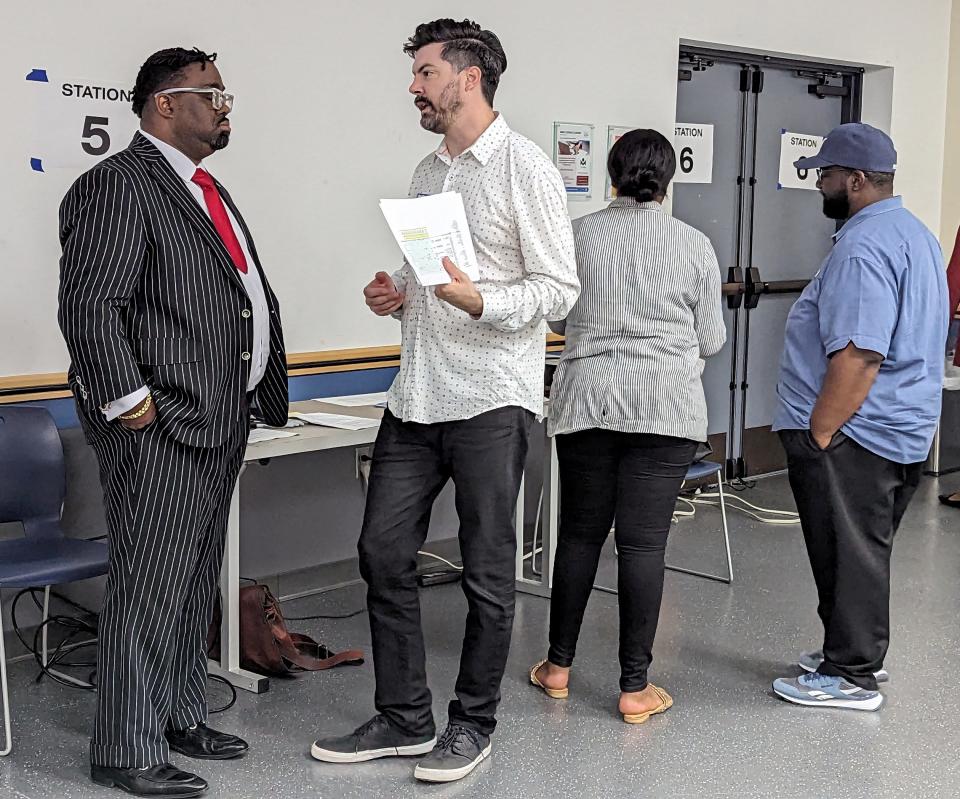 Bockus Payne architect Collin Fleck and other designers speak with community residents during a listening session for the upcoming Clara Luper Civil Rights Center in northeast Oklahoma City.