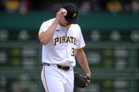 Pittsburgh Pirates starting pitcher Paul Skenes collects himself before delivering the first pitch in his major league debut against the Chicago Cubs Mike Tauchman to open the first inning of a baseball game in Pittsburgh, Saturday, May 11, 2024. (AP Photo/Gene J. Puskar)