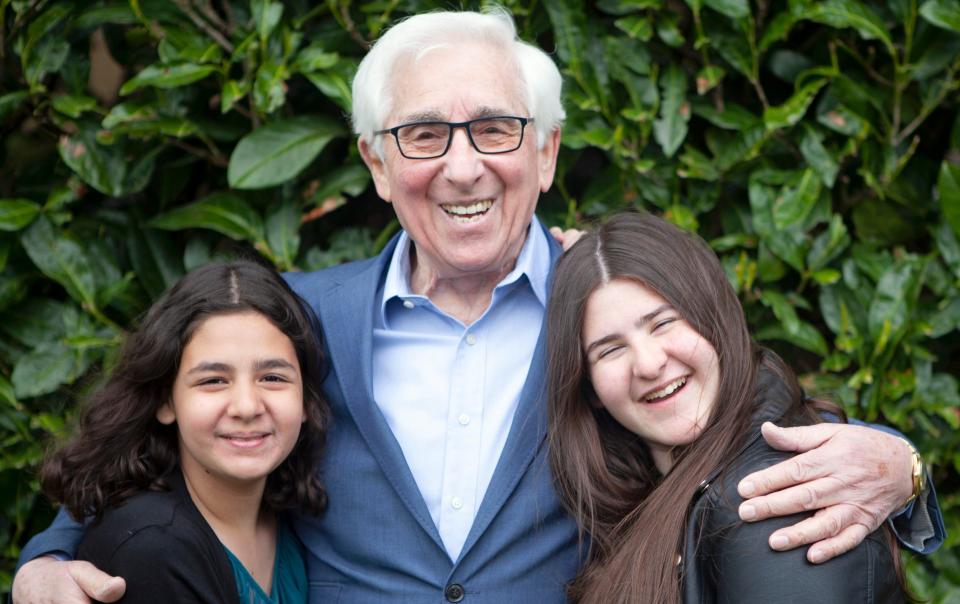 Holocaust survivor Saul Erner, aged 86, with his granddaughters - Sian Bonnell