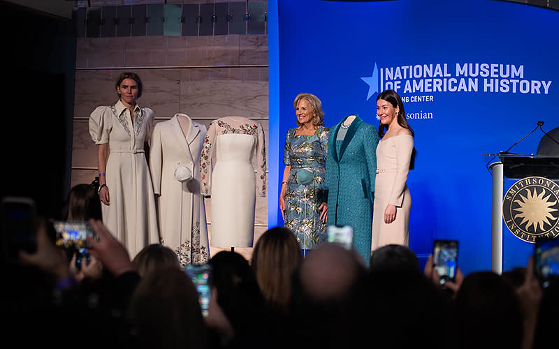 Designer Gabriela Hearst, first lady Jill Biden and designer Alexandra O’Neill present Biden’s inaugural ensembles to the First Ladies Collection at the National Museum of American History in Washington, D.C., on Jan. 25. <em>Annabelle Gordon</em>