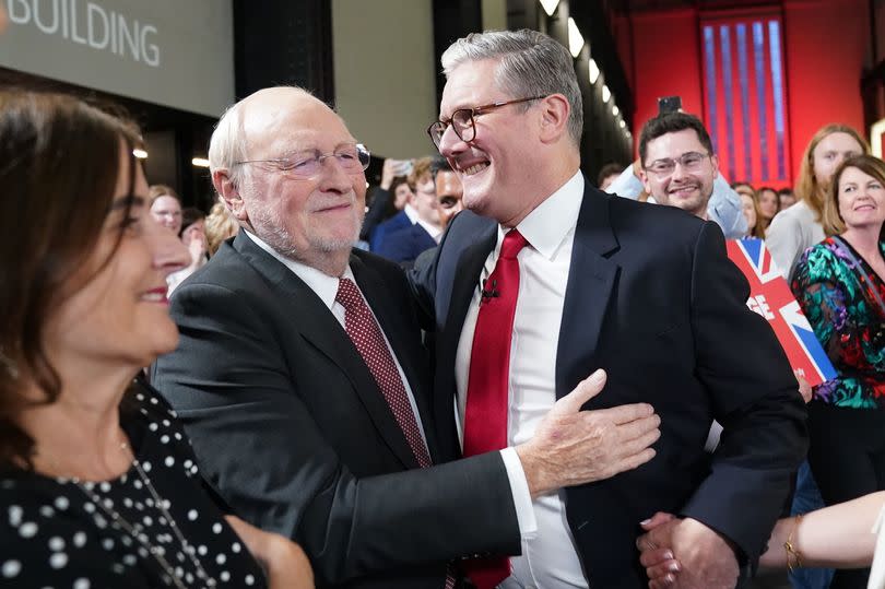 Labour leader Sir Keir Starmer is greeted by Neil Kinnock at the Tate Modern, central London, for a watch party for the results of the 2024 General Election, as the party appears on course for a landslide win in the 2024 General Election