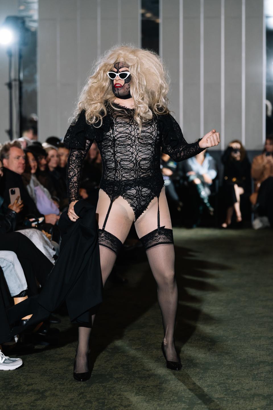 Designer Ervin Latimmier on his own runway as his drag queen alter ego “Anna Conda”