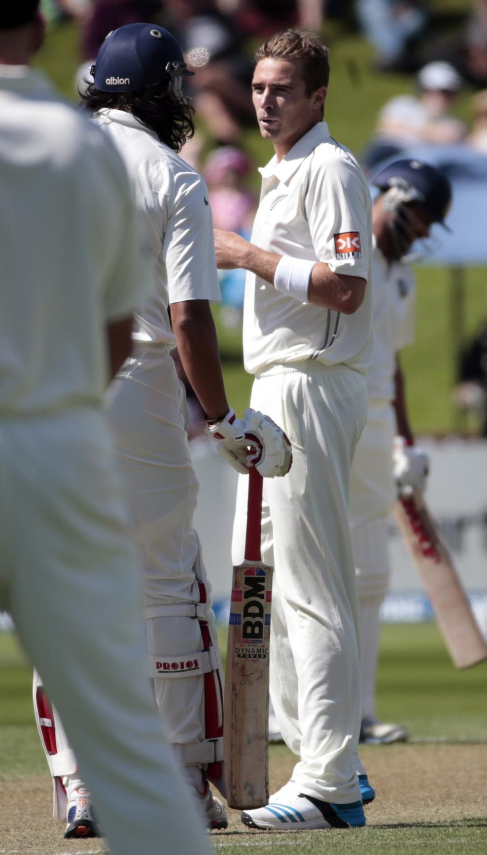 India's Ishant Sharma and New Zealand's Tim Southee (R) exchange words during the first innings on day two of the second international test cricket match at the Basin Reserve in Wellington, February 15, 2014. REUTERS/Anthony Phelps (NEW ZEALAND - Tags: SPORT CRICKET)