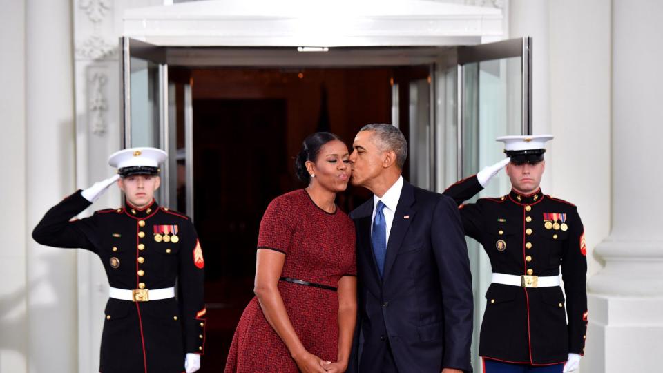 <p>Barack gave his wife a kiss as they left the White House in January 2017.</p>