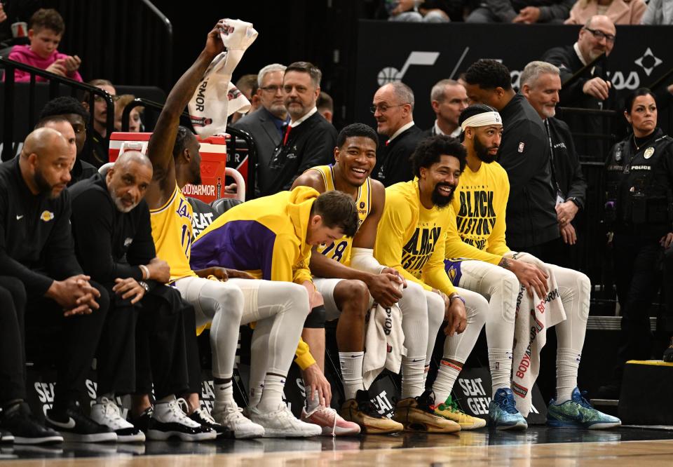 Los Angeles Lakers players celebrate on the bench as the game nears an end as the Utah Jazz and the Los Angeles Lakers play at the Delta Center in Salt Lake City on 2/14/24. LA won 138-122. | Scott G Winterton, Deseret News