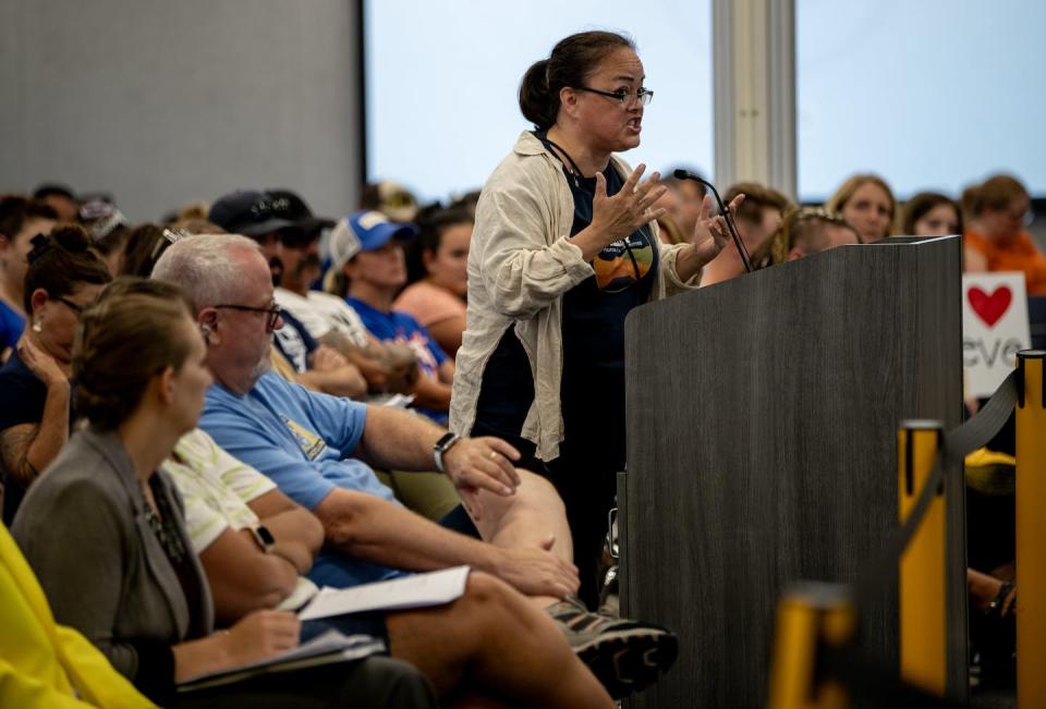 A speaker at a California school board meeting objects to book bans, a topic that has raised passions nationwide. <a href="https://www.gettyimages.com/detail/news-photo/retired-police-sgt-gia-rueda-speaks-out-against-book-news-photo/1541835489" rel="nofollow noopener" target="_blank" data-ylk="slk:Gina Ferazzi / Los Angeles Times via Getty Images;elm:context_link;itc:0;sec:content-canvas" class="link ">Gina Ferazzi / Los Angeles Times via Getty Images</a>