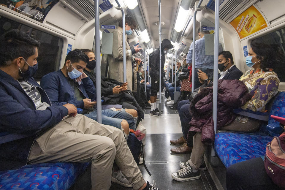 Passengers wearing face masks on the Jubilee Line in London, as workers are being encouraged to return to their offices, with a Government PR blitz commencing this week reminding people about the efforts taken to make workplaces "Covid-secure". (Photo by Victoria Jones/PA Images via Getty Images)