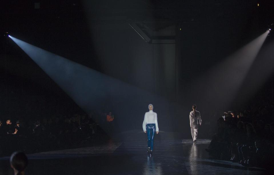 Models wear creations as part of designers Nicola Formichetti and Sebastien Teigne fashion collection for Thierry Mugler's Ready to wear Fall/Winter 2013/2014 in Paris, Wednesday, Feb. 27 2013. (AP Photo/ Jacques Brinon)