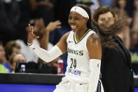 Dallas Wings guard Arike Ogunbowale (24) celebrates a three-point shot during a WNBA basketball game against the Chicago Sky, Wednesday, May 15, 2024, in Arlington, Texas. Dallas won 87-79. (AP Photo/Brandon Wade)