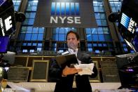 A trader works on the floor of the NYSE in New York