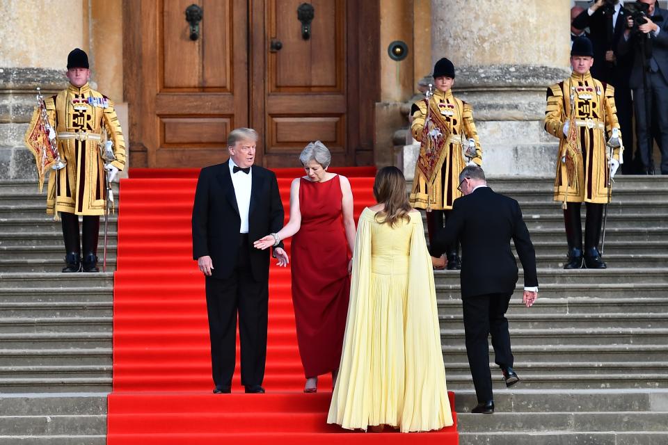 Melania Trump ascends the stairs at Blenheim Palace.