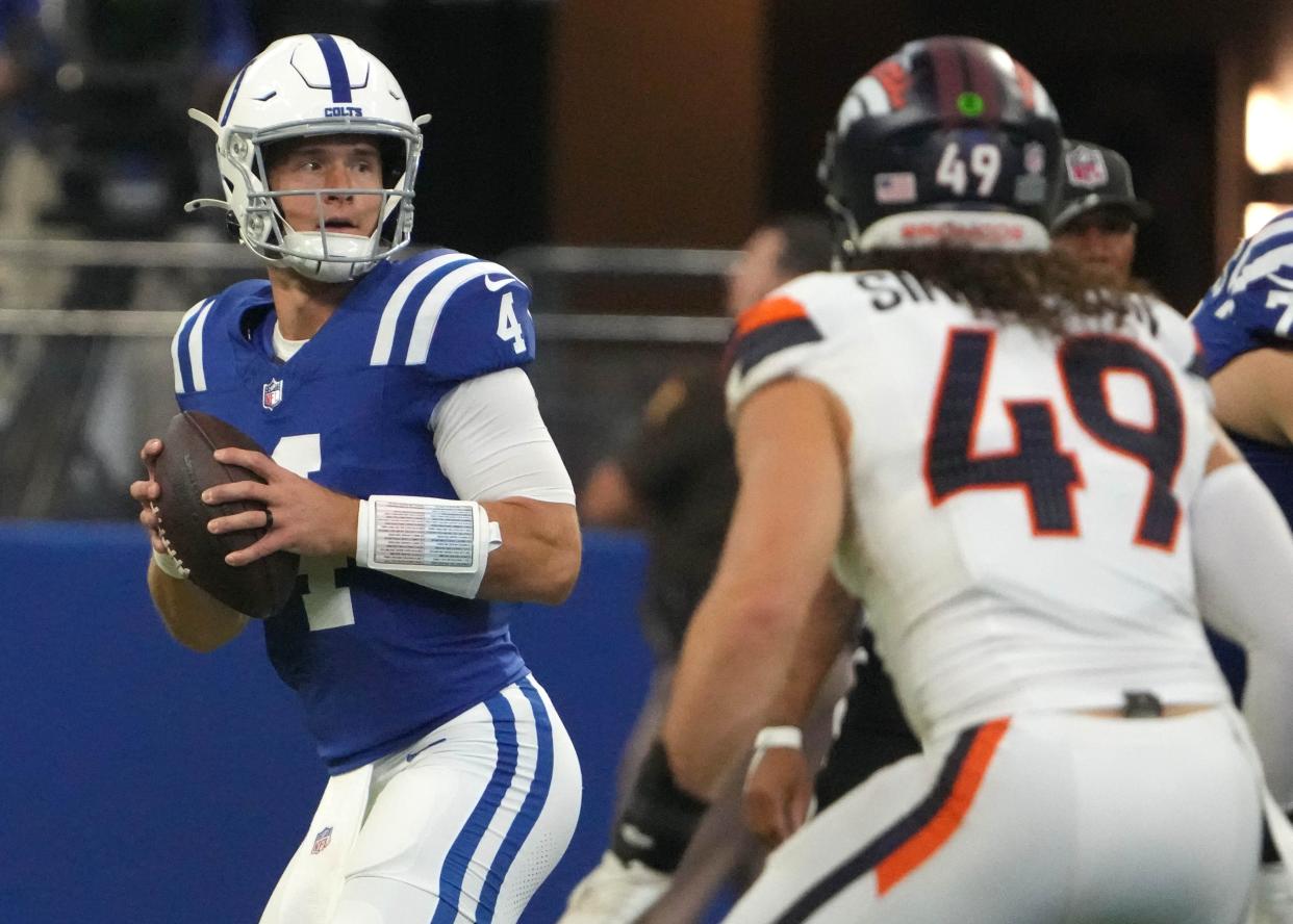 Indianapolis Colts quarterback Sam Ehlinger (4) throws a pass during the second half of a preseason game against the Denver Broncos on Sunday, Aug. 11, 2024, at Lucas Oil Stadium in Indianapolis. The Broncos defeated the Colts 34-30.