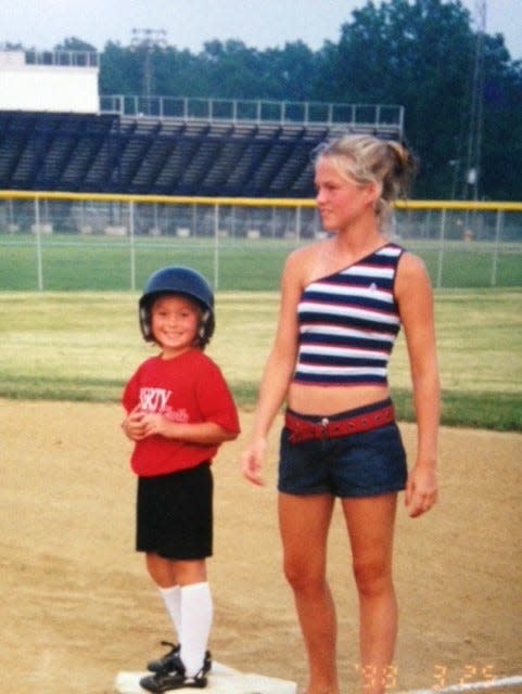 Reporter Allie LaForce, right, in a family photo with her sister, AuBree LaForce.