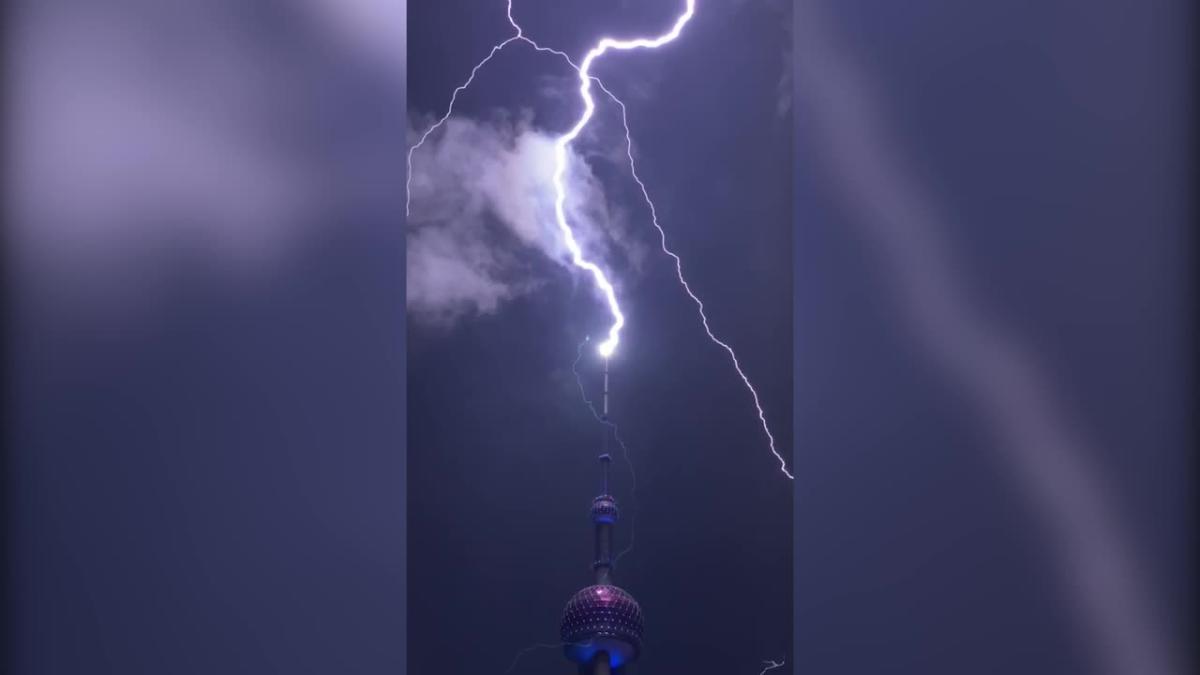 Lighting strikes Shanghai's Oriental Pearl Tower during storm