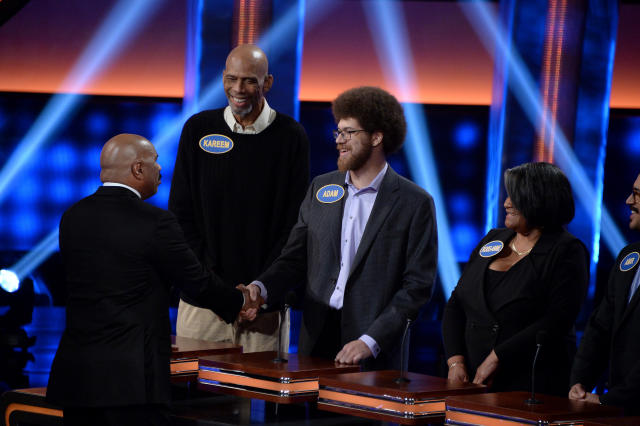 CELEBRITY FAMILY FEUD - &quot;Harvey Family Men vs Harvey Family Women and Kareem Abdul-Jabbar vs Ralph Sampson&quot;- The celebrity teams competing to win cash for their charities features Steve Harvey's wife, Marjorie Harvey, leading a team with their sons and sons-in-law, and the other team will be led by Mrs. Harvey's mother and the Harvey daughters. In a separate game, family members from the NBA's all-time leading scorer and six-time NBA champion Kareem Abdul-Jabbar will take on retired NBA Legend Ralph Sampson and his family. This episode of &quot;Celebrity Family Feud&quot; airs SUNDAY, JUNE 25 (8:00-9:00 p.m. EDT), on The Walt Disney Television via Getty Images Television Network.. (Eric McCandless/Walt Disney Television via Getty Images) STEVE HARVEY, KAREEM ABDUL-JABBAR, ADAM ABDUL-JABBAR, ROSE-ANN SWANN