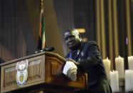 CAPTION CORRECTION - CORRECTING ID Former President of Zambia Kenneth Kaunda speaks during the funeral ceremony for former South African President Nelson Mandela in Qunu December 15, 2013. REUTERS/Odd Andersen/Pool (SOUTH AFRICA - Tags: SOCIETY OBITUARY POLITICS)