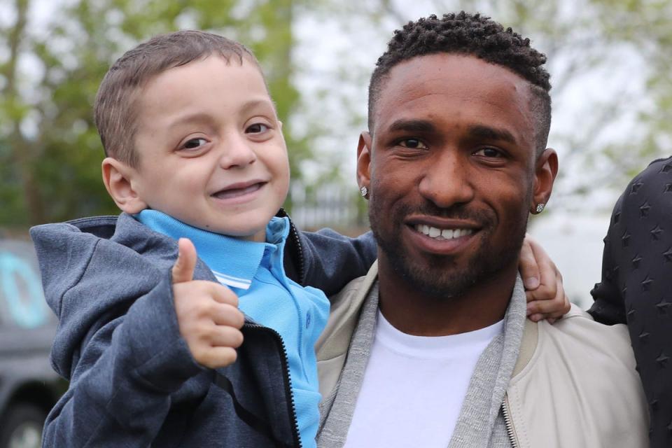 In the months before his death, Bradley, whose favourite club was Sunderland, led England out at Wembley alongside former Black Cats striker Jermain Defoe (right) (PA Archive)