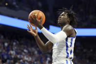 Kentucky's Chris Livingston (24) shoots during the first half of the team's NCAA college basketball game against Kansas in Lexington, Ky., Saturday, Jan. 28, 2023. (AP Photo/James Crisp)