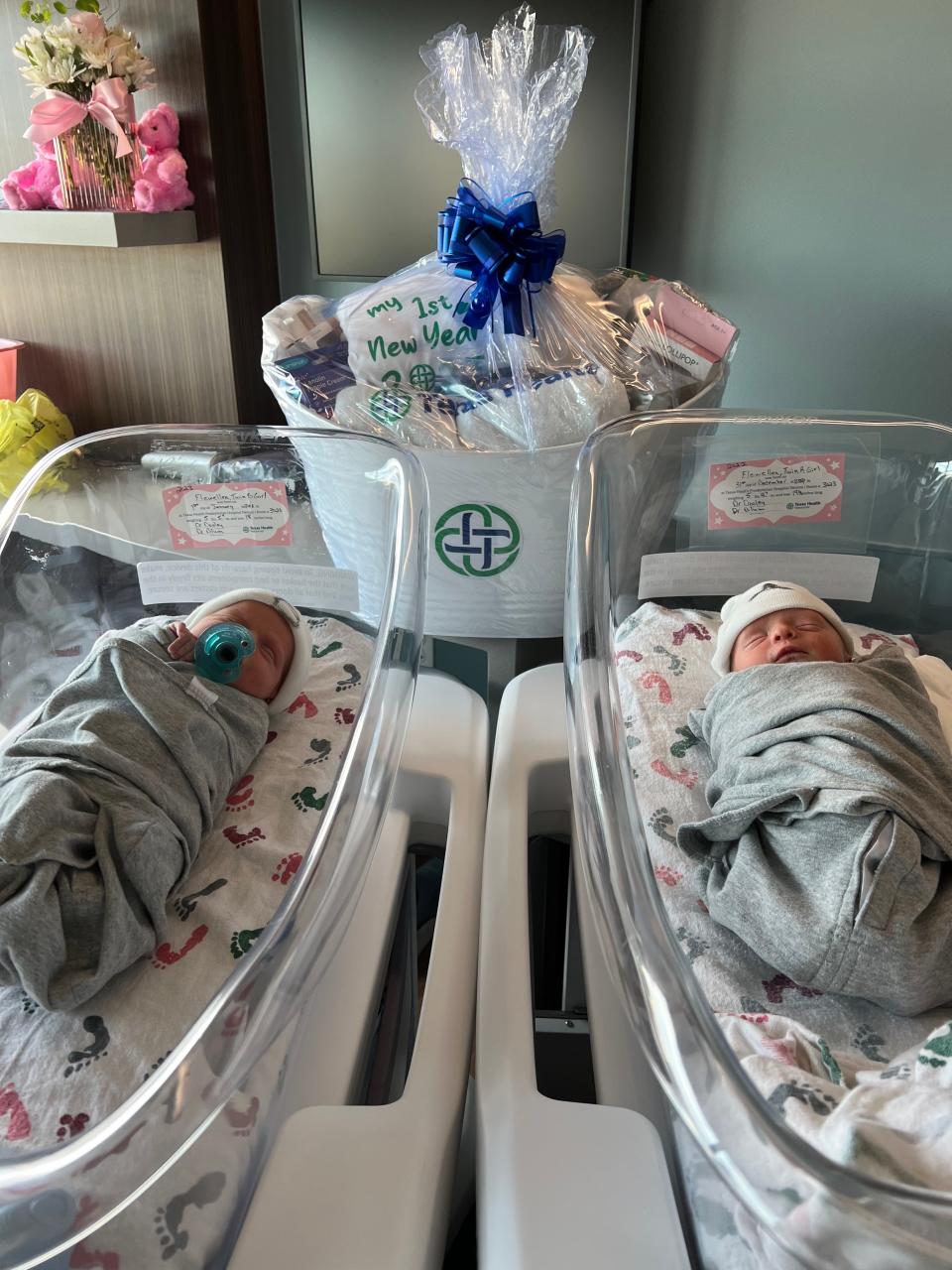 Effie Rose Scott, at left, who was born at 12:01 a.m. Jan. 1, 2023 at Texas Health Presbyterian Hospital Denton, and her twin sister, Annie Jo, who was born at 11:55 p.m. ET on Dec. 31, 2022.