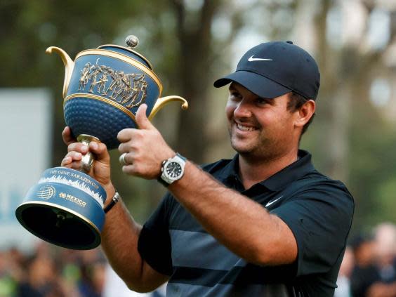 Patrick Reed celebrates victory (EPA)