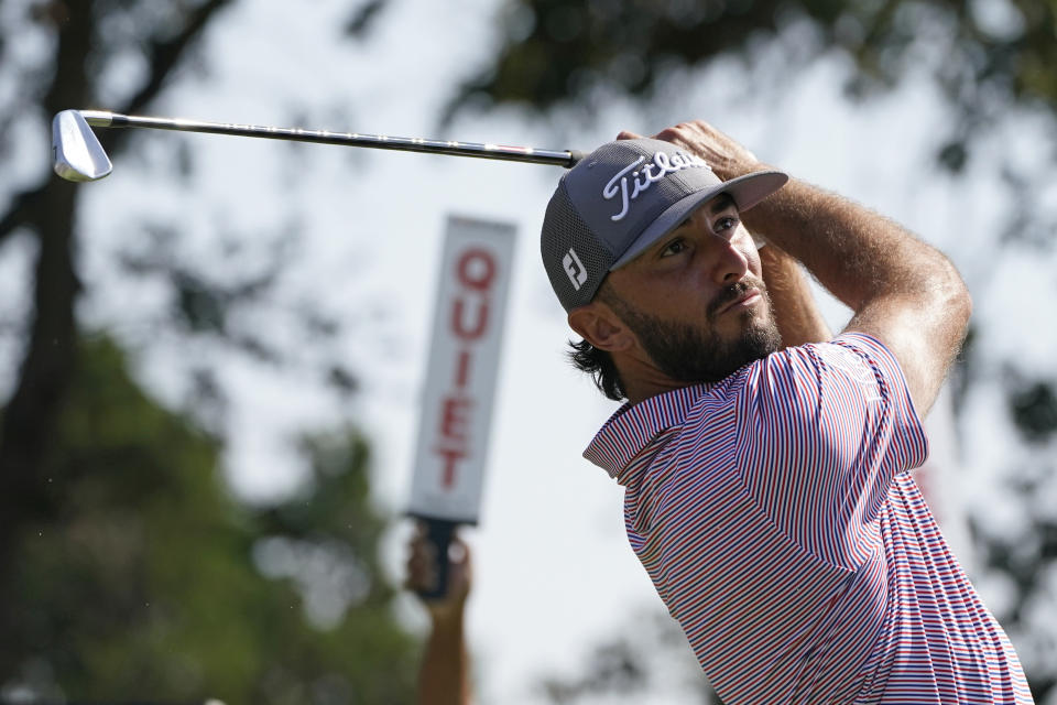 Max Homa watches his shot from the second tee of the Silverado Resort North Course during the first round of the Fortinet Championship PGA golf tournament in Napa, Calif., Thursday, Sept. 15, 2022. (AP Photo/Eric Risberg)