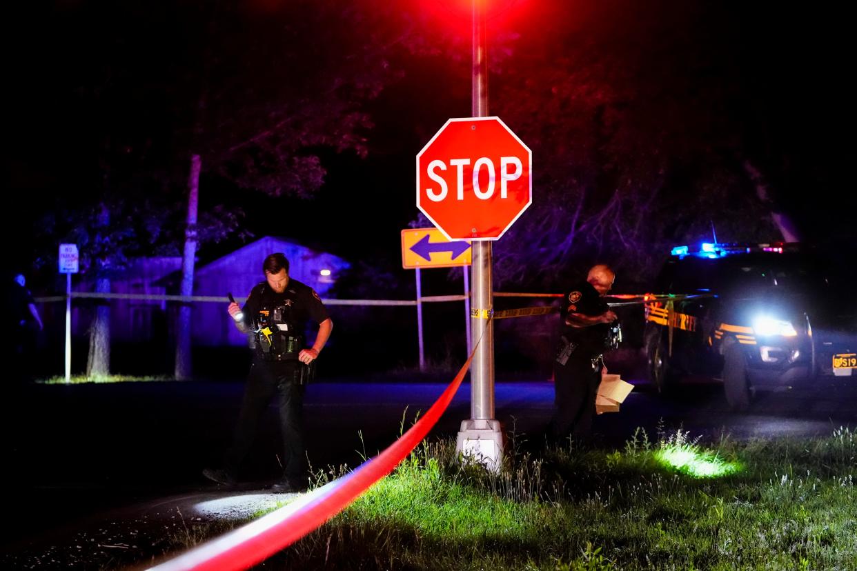 Jul 22, 2023; Columbus, Ohio, USA;  Franklin County Sheriffs deputies and Franklin Township Police investigate the scene of a shooting on the South Side. Blood evidence was collected and more than 30 shell casings were found at the scene near the intersection of Hart and Brown roads.